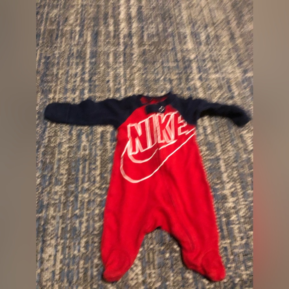 Red and blue Nike newborn sleeper